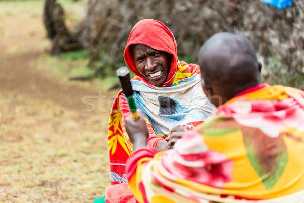 Massai men shaking hand concluding an agreement Stock photo © Kzenon