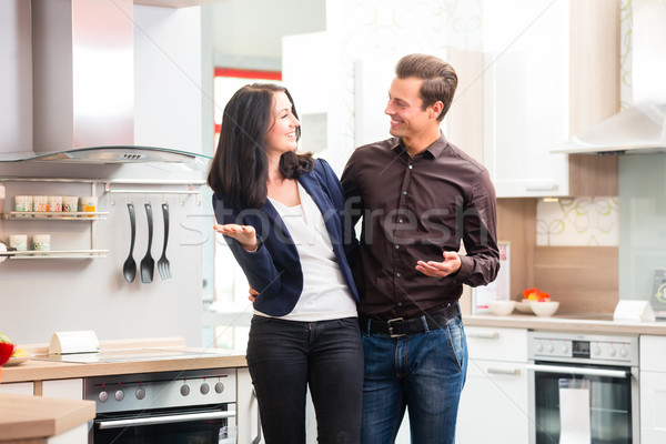 Couple buying domestic kitchen furniture store Stock photo © Kzenon