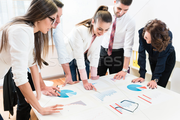 Stock photo: Financial consultants in bank analyzing data