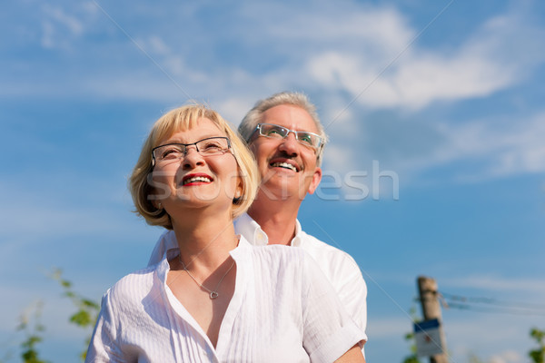 [[stock_photo]]: Heureux · couple · de · personnes · âgées · regarder · ciel · bleu · maturité · couple