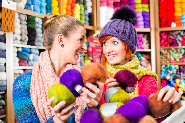 Young women in knitting shop Stock photo © Kzenon