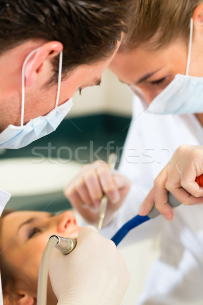 Paciente dentista dentales tratamiento femenino ayudante Foto stock © Kzenon