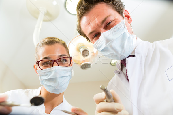 Tratamiento dentista perspectiva paciente ayudante mujer Foto stock © Kzenon
