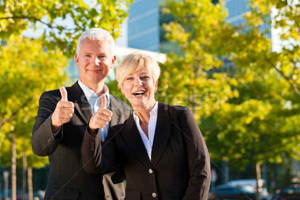 Business people in a park outdoors Stock photo © Kzenon