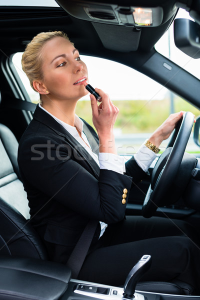 女性 口紅 運転 車 ビジネス スーツ ストックフォト