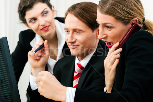 Business team working in the office Stock photo © Kzenon
