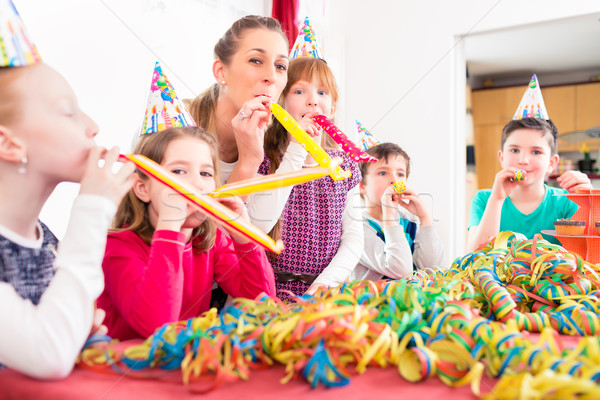 Stock photo: Children having birthday party with fun