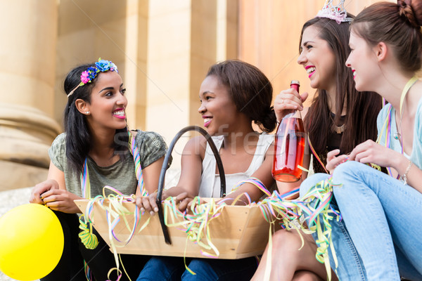 Girls having drink together on bachelorette party Stock photo © Kzenon
