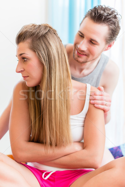 Young lovers, woman and man, having a dispute at home and woman  Stock photo © Kzenon