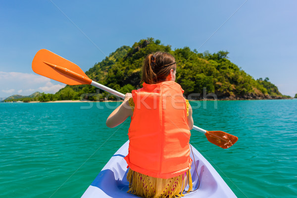 Rear view of young woman experiencing freedom during vacation Stock photo © Kzenon