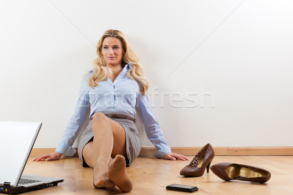 Businesswoman at home Stock photo © Kzenon