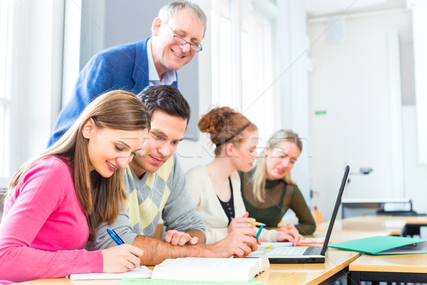 Group of students learning at college Stock photo © Kzenon