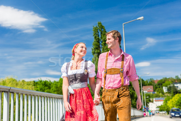 Couple visiting Bavarian fair having fun Stock photo © Kzenon