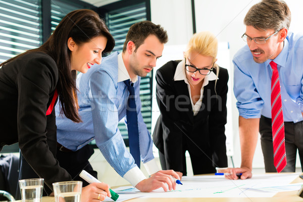 Business - People in office working as team Stock photo © Kzenon
