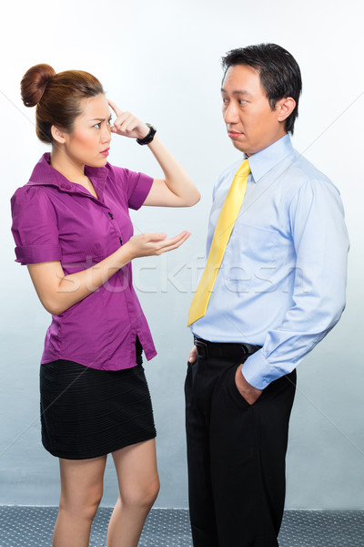 Crisis in Asian business office among colleagues Stock photo © Kzenon