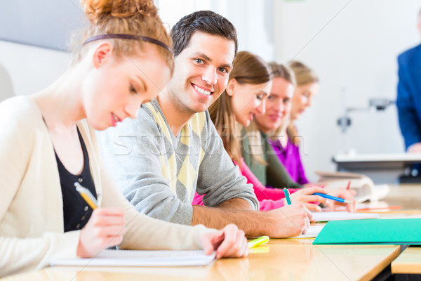 College students writing test Stock photo © Kzenon