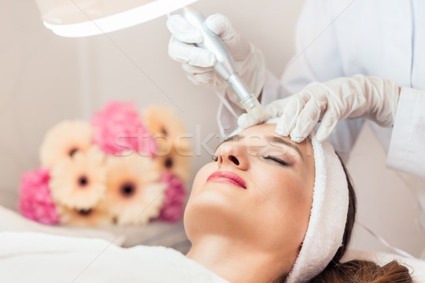 Close-up of the face of a woman relaxing during non-surgical fac Stock photo © Kzenon
