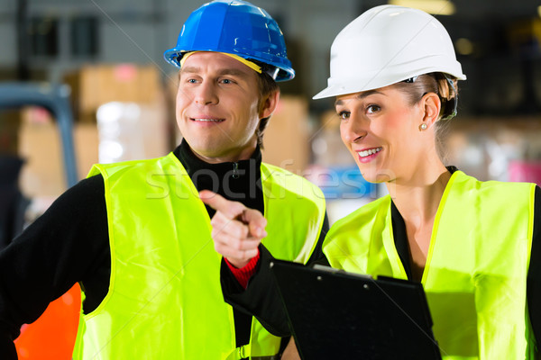 Forklift driver and supervisor at warehouse Stock photo © Kzenon