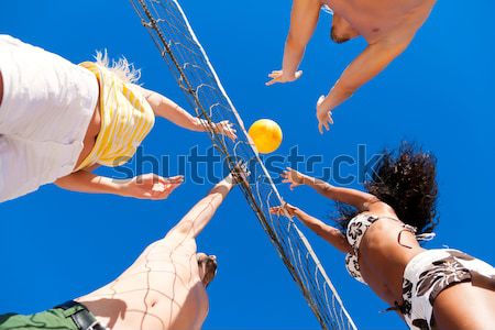Vrienden spelen strand volleybal spelers zomer Stockfoto © Kzenon