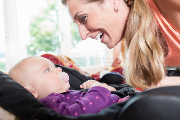 Moms and babies in mother and child course practicing Stock photo © Kzenon