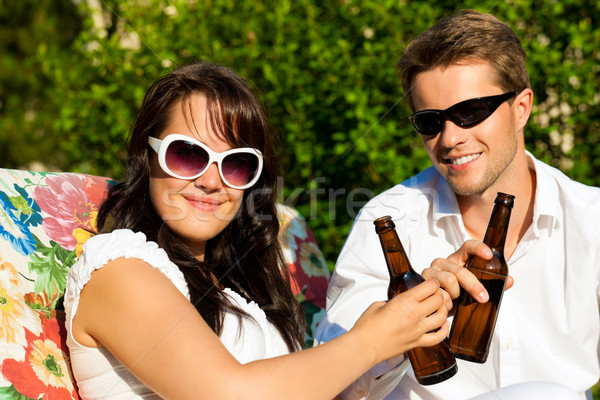 Couple drinking beer in summer Stock photo © Kzenon