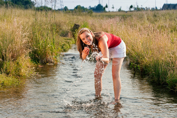Nő áll patak nyár kicsi víz Stock fotó © Kzenon