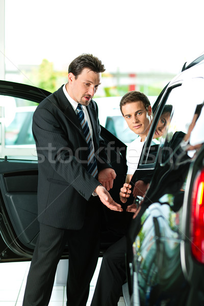 Man buying car from salesperson Stock photo © Kzenon