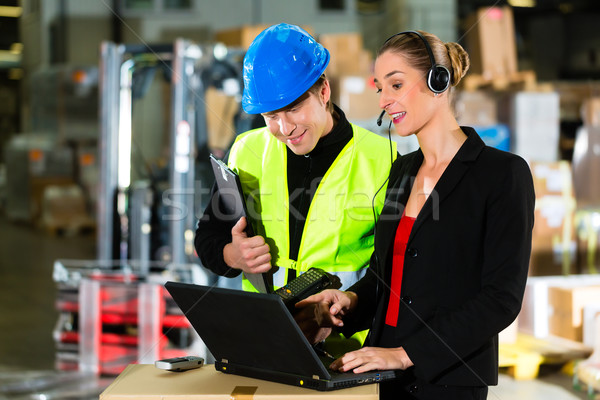 Coworkers at warehouse of forwarding company Stock photo © Kzenon