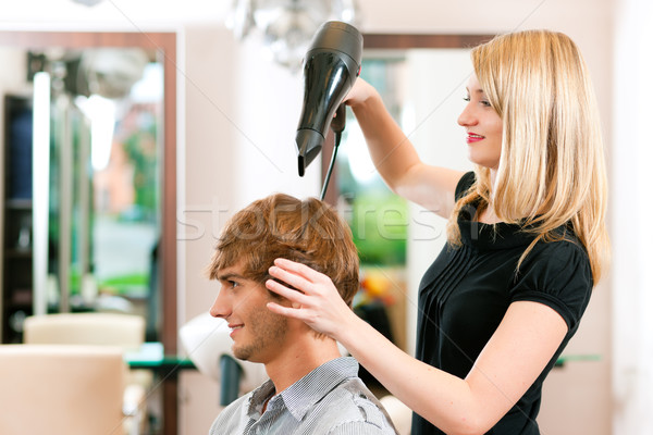 Man at the hairdresser Stock photo © Kzenon