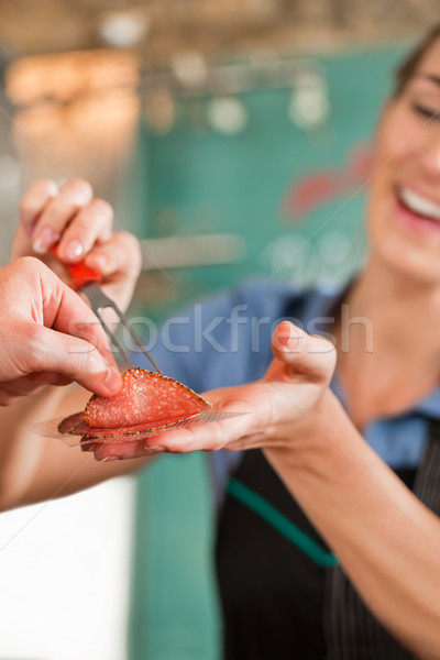 Kobiet rzeźnik świeże mięsa klienta Zdjęcia stock © Kzenon