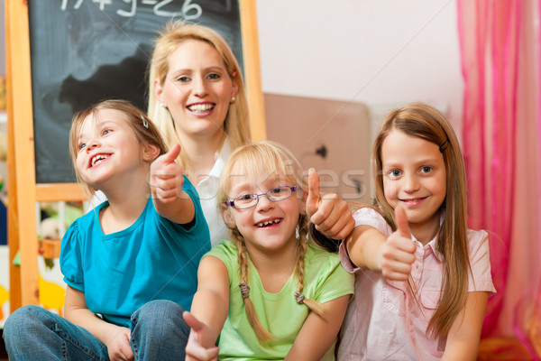 Mother with schoolchildren Stock photo © Kzenon