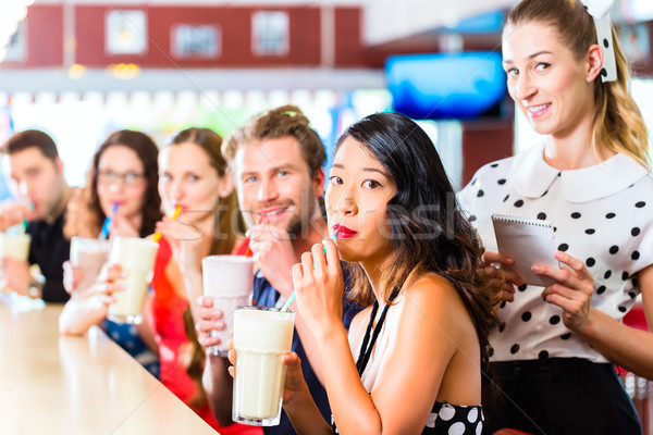 люди американский Diner ресторан молоко друзей Сток-фото © Kzenon