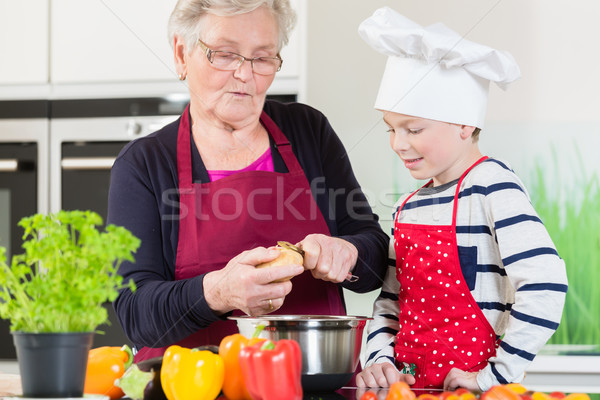Grandma and grandson cooking together Stock photo © Kzenon