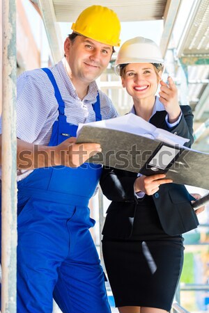 Production manager and designer in Asian factory Stock photo © Kzenon