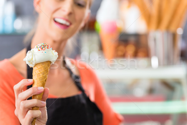 Female seller in Parlor with ice cream cone Stock photo © Kzenon
