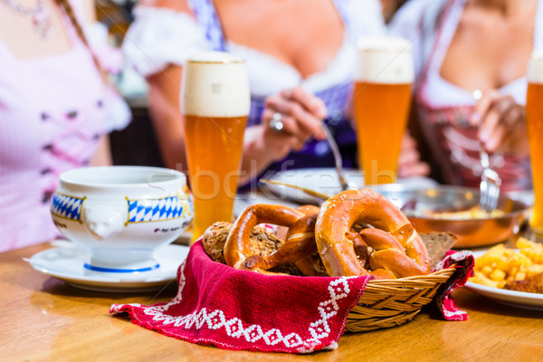 Women eating lunch in Bavarian Restaurant Stock photo © Kzenon