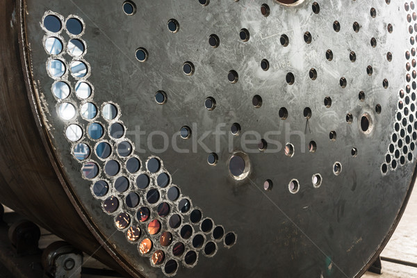 Close-up of the surface of a metallic industrial boiler Stock photo © Kzenon