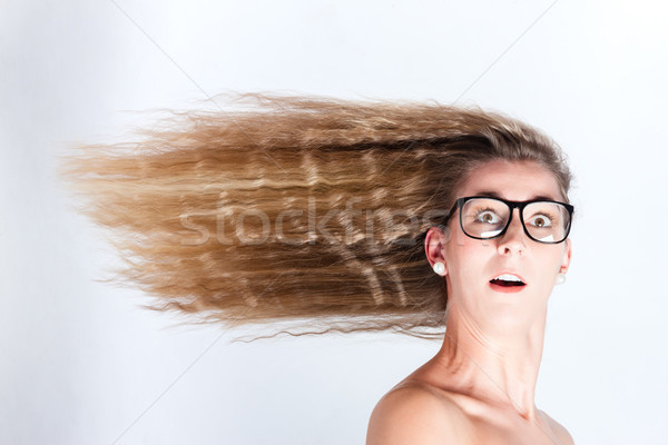 Long hair of woman blown by the wind Stock photo © Kzenon