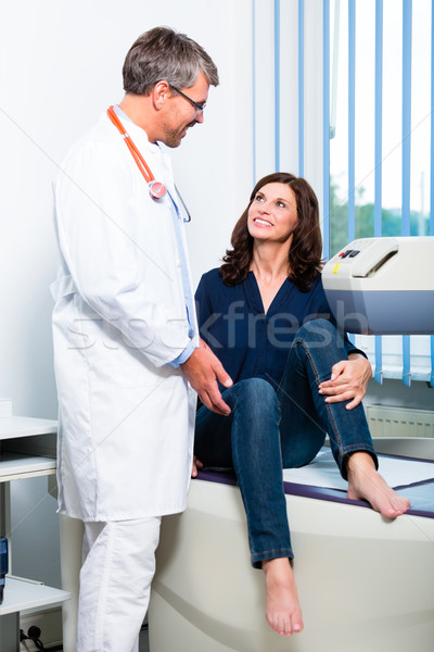 Doctor doing ultrasonic on patient in surgery Stock photo © Kzenon