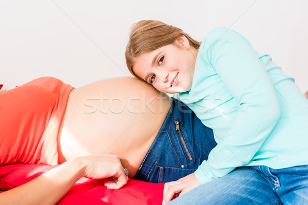 Stock photo: on baby-bump of pregnant woman