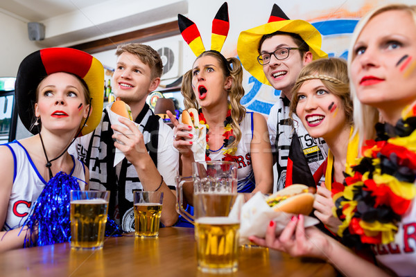 Soccer fans watching a game of the German national team Stock photo © Kzenon