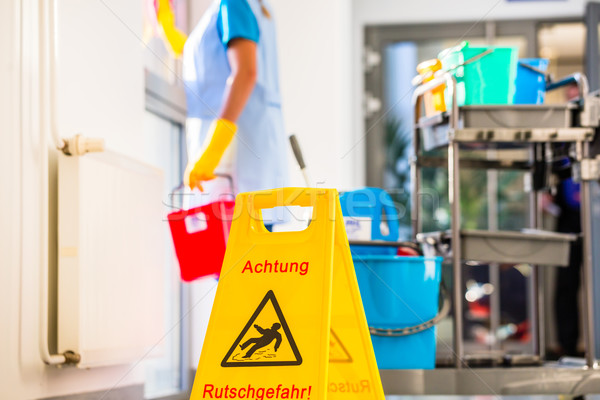 警告標誌 地板 清洗 手術 女子 工作的 商業照片 © Kzenon