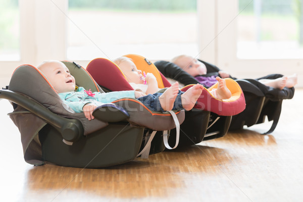 New-born babies in toddler group lying in baby shells Stock photo © Kzenon
