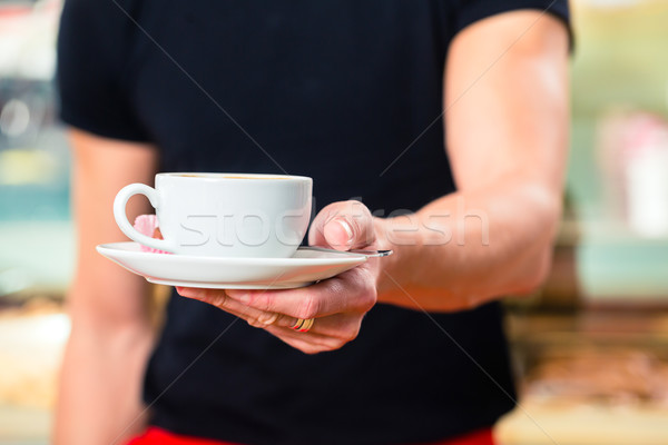 Waiter working in ice cream cafe Stock photo © Kzenon