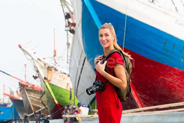 Jakarta touristiques caméra port tournée femme [[stock_photo]] © Kzenon