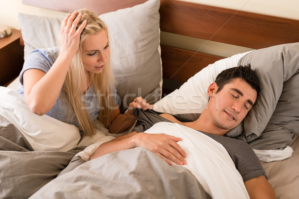 Man slapen bed partner uitgeput jonge man Stockfoto © Kzenon