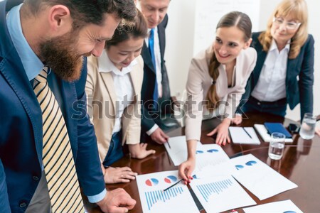 People in office working as team Stock photo © Kzenon