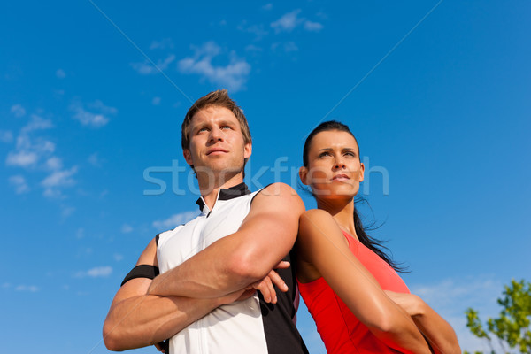 Young couple is doing sports outdoors Stock photo © Kzenon