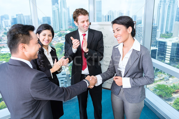 Business team applause in meeting Stock photo © Kzenon