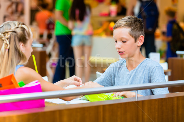 Children eating in cafe at shopping mall Stock photo © Kzenon
